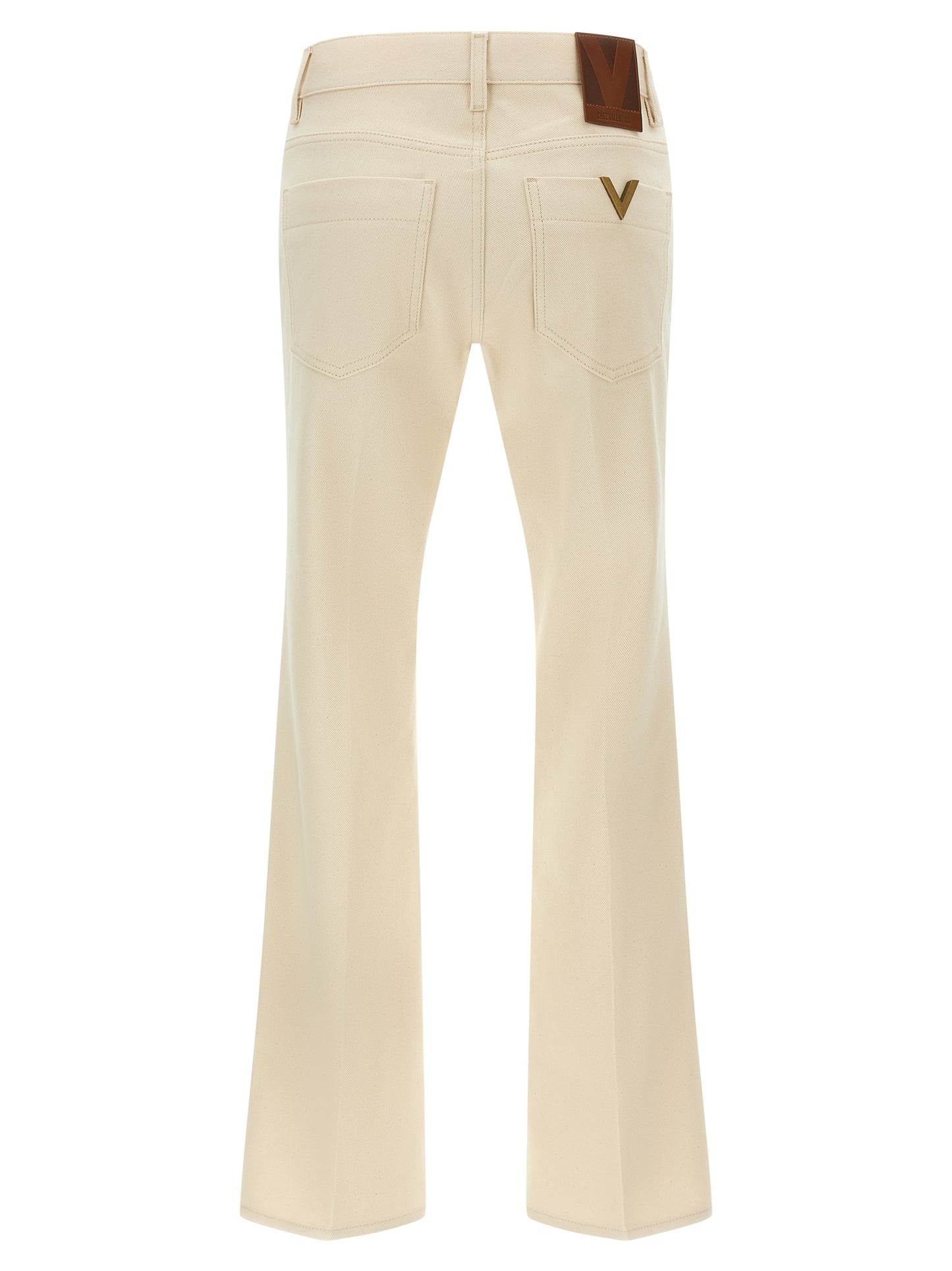 Jeans by Valentino Garavani for women in denim cotton beige features an sartorial flared and long with a cut for a sartorial finish.