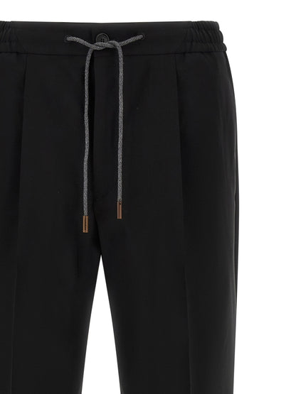 Trousers by Incotex for men in plush virgin wool black presents a perennial silhouette, meticulously tailored with a straight-leg & relaxed-fit cut, long finish, and an elegant .