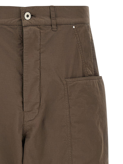 Cargo Pants by DRKSHDW for men in cotton brown & patterned features a architectural relaxed-fit & wide with a architectural long and architectural .