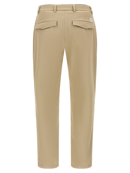Trousers by Department 5 for men in stretch cotton beige features a tailored silhouette with a tailored cropped, defined by its cropped and a sophisticated .