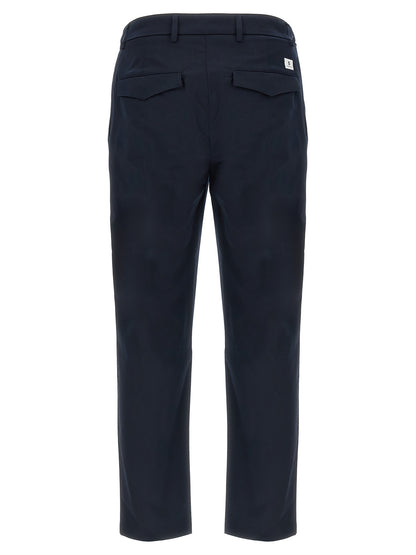 Trousers by Department 5 for men in stretch cotton blue & signature presents a perennial silhouette, meticulously tailored with a cropped cut, cropped finish, and an elegant .