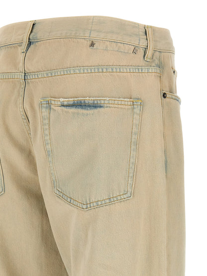 Jeans by Golden Goose for men in denim cotton beige features a polished silhouette with a polished straight-leg & wide, reaching a polished long and finished with a polished .