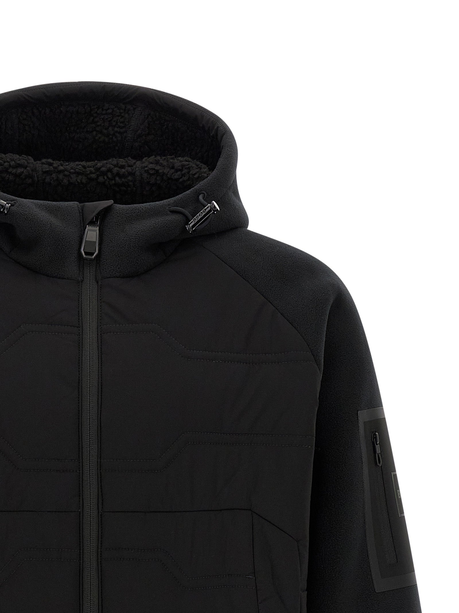 Hooded Vest by Hugo Boss for men in plush polyester black showcases a dynamic silhouette, perfectly balancing pockets, hooded & windproof with a dynamic hooded high-neck neckline for a sophisticated, high-fashion look.