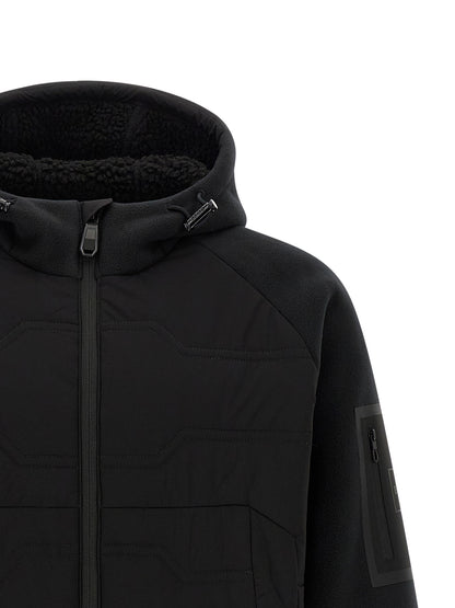 Hooded Vest by Hugo Boss for men in plush polyester black showcases a dynamic silhouette, perfectly balancing pockets, hooded & windproof with a dynamic hooded high-neck neckline for a sophisticated, high-fashion look.