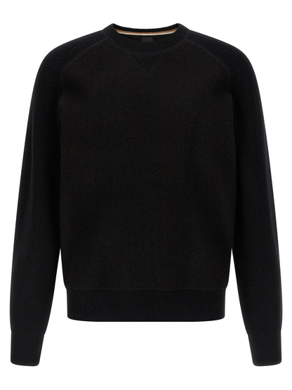 Cardigan by Hugo Boss for men in virgin wool black showcases a luxurious silhouette, meticulously detailed with a sophisticated crew neckline and for a refined finish.