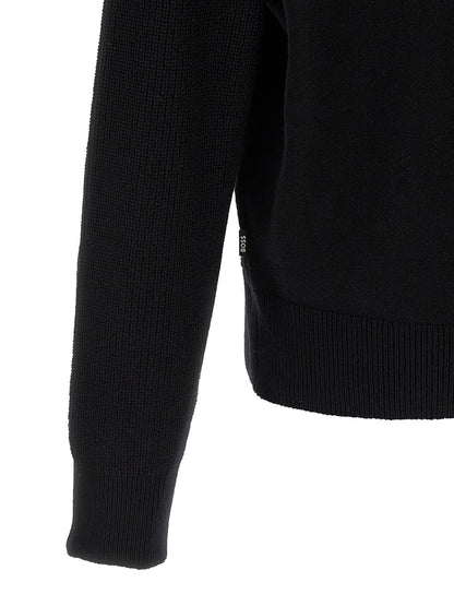Cardigan by Hugo Boss for men in virgin wool black showcases a luxurious silhouette, meticulously detailed with a sophisticated and for a refined finish.