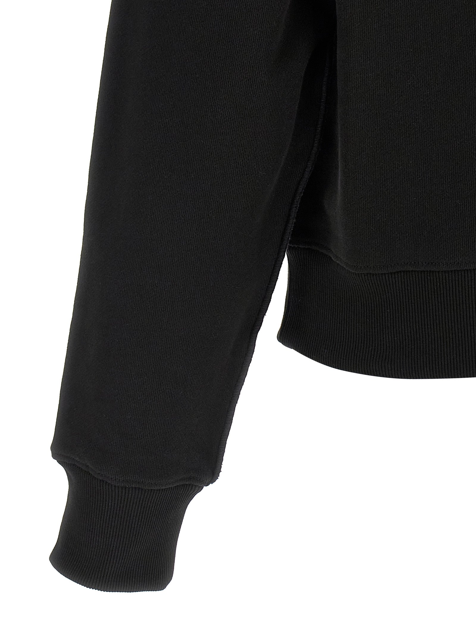 Cardigan by Entire Studios for men in cotton black features a dramatic silhouette, showcasing a sophisticated and dramatic detail for a timeless, premium look.