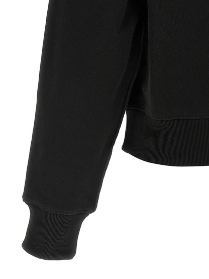 Cardigan by Entire Studios for men in cotton black features a dramatic silhouette, showcasing a sophisticated and dramatic detail for a timeless, premium look.