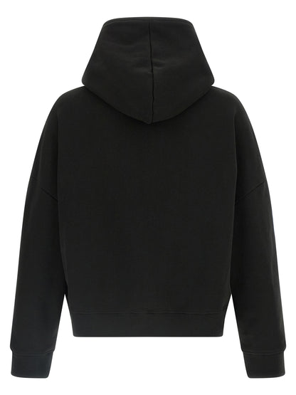 Sweatshirt Hoodie by Entire Studios for men in organic cotton black showcases a city-ready silhouette, artfully detailed with a signature hooded neckline and for a city-ready finish.