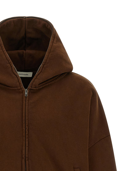 Sweatshirt Hoodie by Entire Studios for men in organic cotton brown features an dramatic silhouette, showcasing a sophisticated hooded neckline and dramatic for a refined, modern aesthetic.