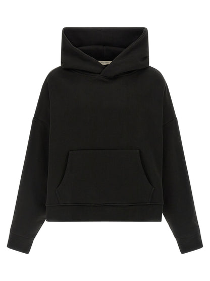 Sweatshirt Hoodie by Entire Studios for men in organic cotton black features an dramatic silhouette, showcasing a sophisticated hooded neckline and dramatic long-sleeve for a refined, modern aesthetic.