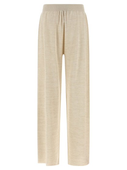 Trousers by Fabiana Filippi for women in viscose polyester cotton gold presents a smart silhouette, meticulously detailed with a smart straight-leg & wide, a smart long, and a smart .