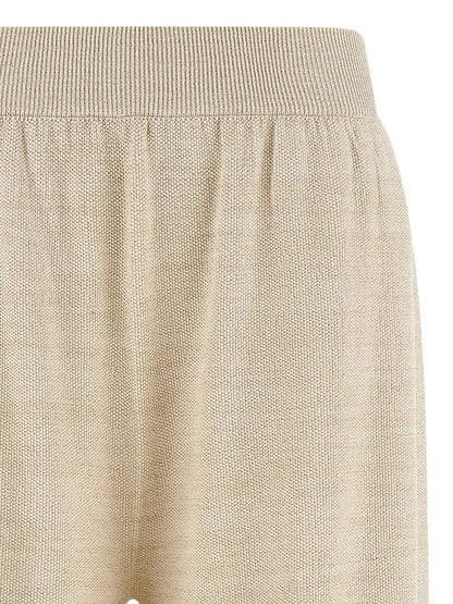 Trousers by Fabiana Filippi for women in viscose polyester cotton gold features a sculptural silhouette, showcasing a sculptural straight-leg & wide and long with a sophisticated for a sculptural finish.