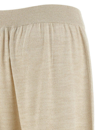 Trousers by Fabiana Filippi for women in viscose polyester cotton gold presents a perennial silhouette, meticulously tailored with a straight-leg & wide cut, long finish, and an elegant .