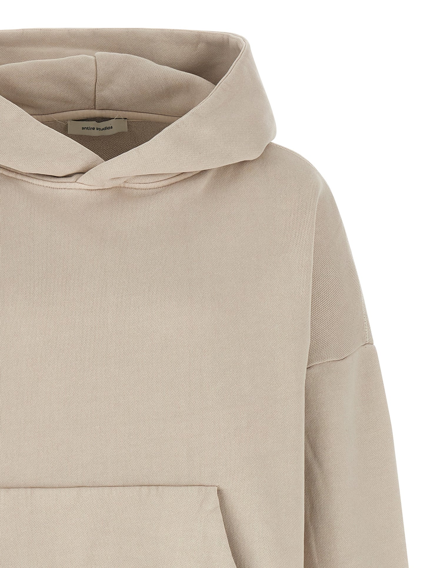 Sweatshirt Hoodie by Entire Studios for men in organic cotton beige features a slouchy chic silhouette, detailed with a slouchy chic and a signature hooded neckline for an elevated aesthetic.