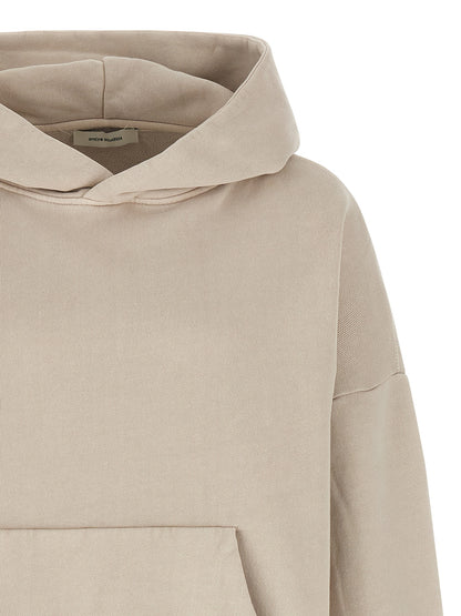 Sweatshirt Hoodie by Entire Studios for men in organic cotton beige features a slouchy chic silhouette, detailed with a slouchy chic and a signature hooded neckline for an elevated aesthetic.