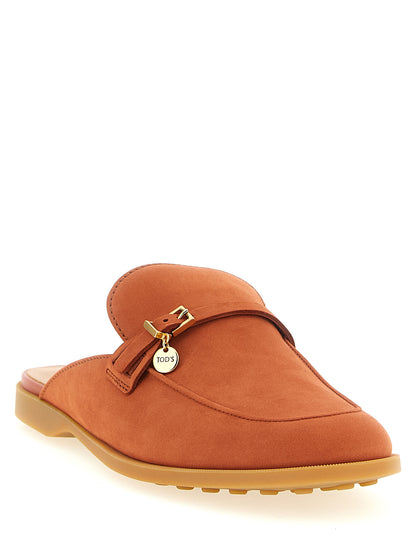 Mules Flat Shoes by Tod's for women in nubuck calfskin leather orange showcases a resplendent Women's Nubuck Calfskin Leather Mules Flat Shoes aesthetic with a and almond toe style.