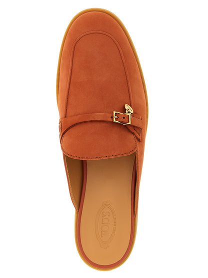 Mules Flat Shoes by Tod's for women in nubuck calfskin leather orange features an statuesque silhouette from the Women's Nubuck Calfskin Leather Mules Flat Shoes collection, showcasing a and a statuesque almond toe style for a statuesque look.