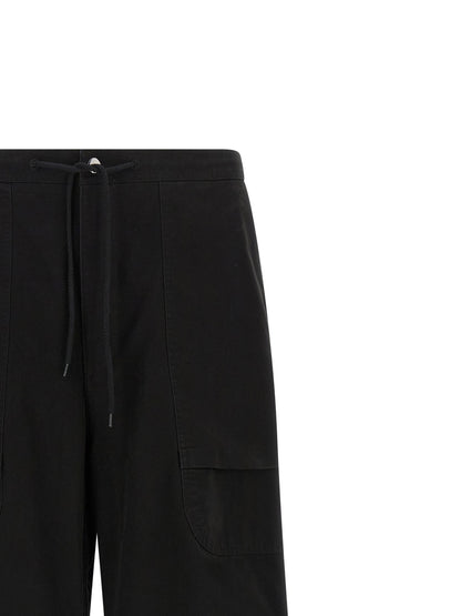 Cargo Pants by Entire Studios for men in cotton black presents a on trend silhouette, artfully finished with a on trend straight-leg & wide, long, and for a sophisticated look.