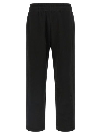 Joggers by Entire Studios for men in cotton black features an sartorial straight-leg & wide and long with a cut for a sartorial finish.