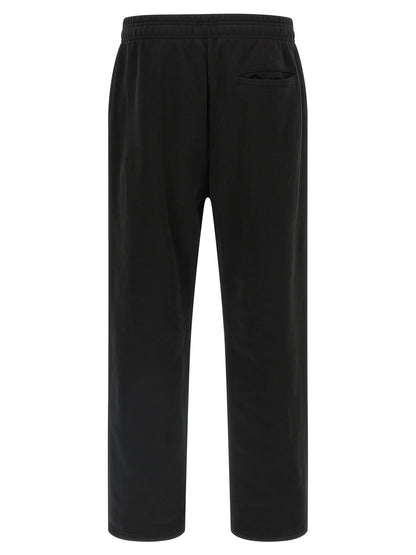 Joggers by Entire Studios for men in cotton black presents a refined pantology silhouette, artfully defined by a refined pantology straight-leg & wide, long, and a sophisticated .