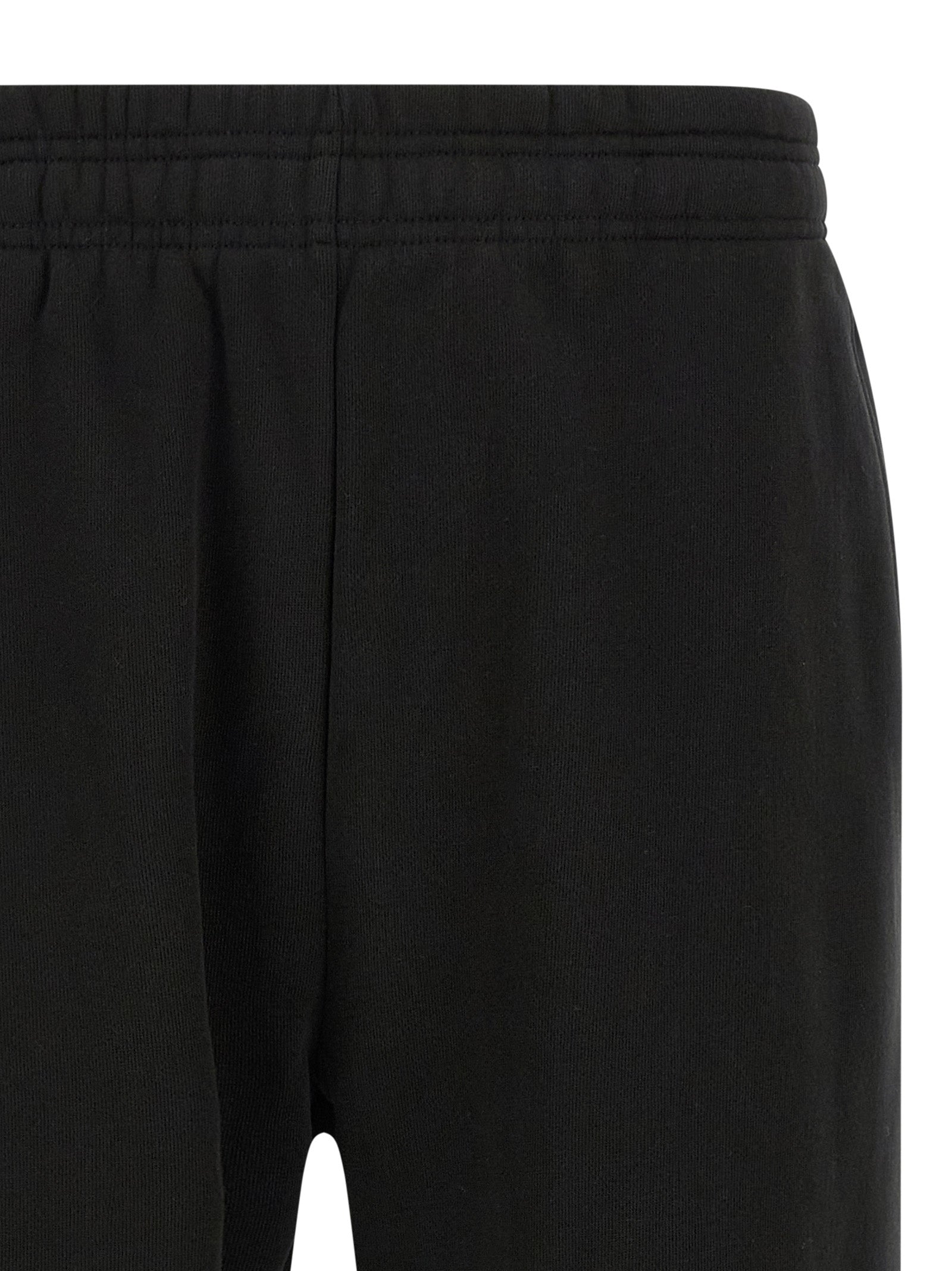 Joggers by Entire Studios for men in cotton black presents a tailored silhouette, showcasing a tailored straight-leg & wide and long cut with a refined for a truly tailored aesthetic.