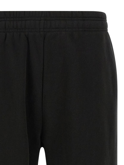Joggers by Entire Studios for men in cotton black presents a tailored silhouette, showcasing a tailored straight-leg & wide and long cut with a refined for a truly tailored aesthetic.