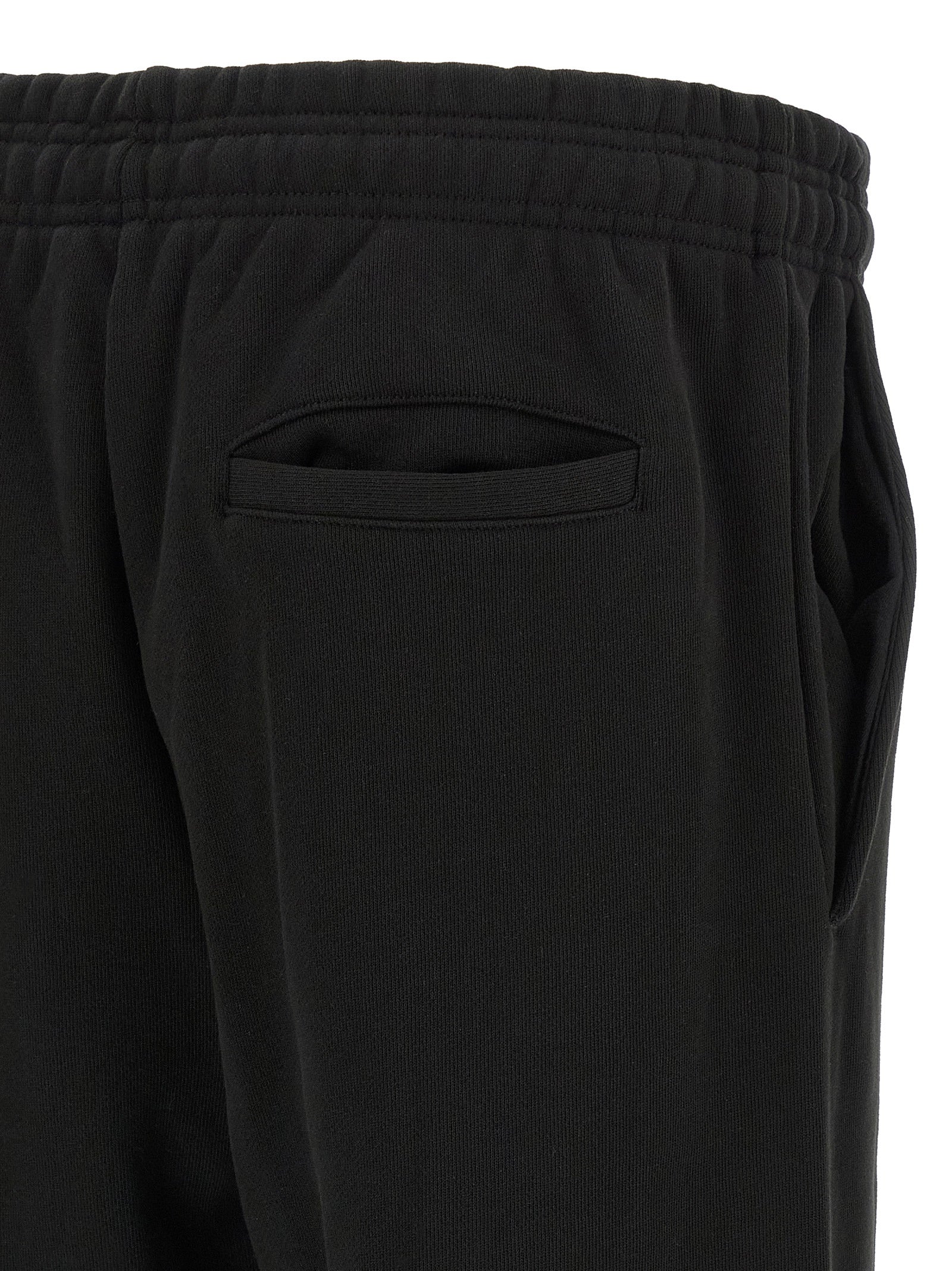 Joggers by Entire Studios for men in cotton black features an refined tailoring silhouette, showcasing a premium straight-leg & wide with a and long cut for a refined tailoring look.