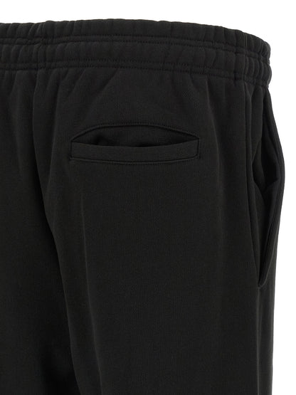 Joggers by Entire Studios for men in cotton black features an refined tailoring silhouette, showcasing a premium straight-leg & wide with a and long cut for a refined tailoring look.