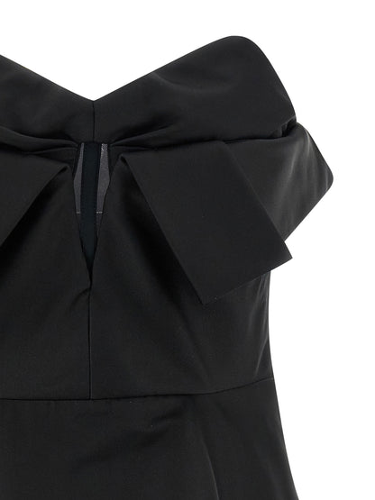 Tank Top by Alexander McQueen for women in polyester & silk black showcases a meticulous silhouette, artfully finished with a meticulous and for a sophisticated, meticulous look.