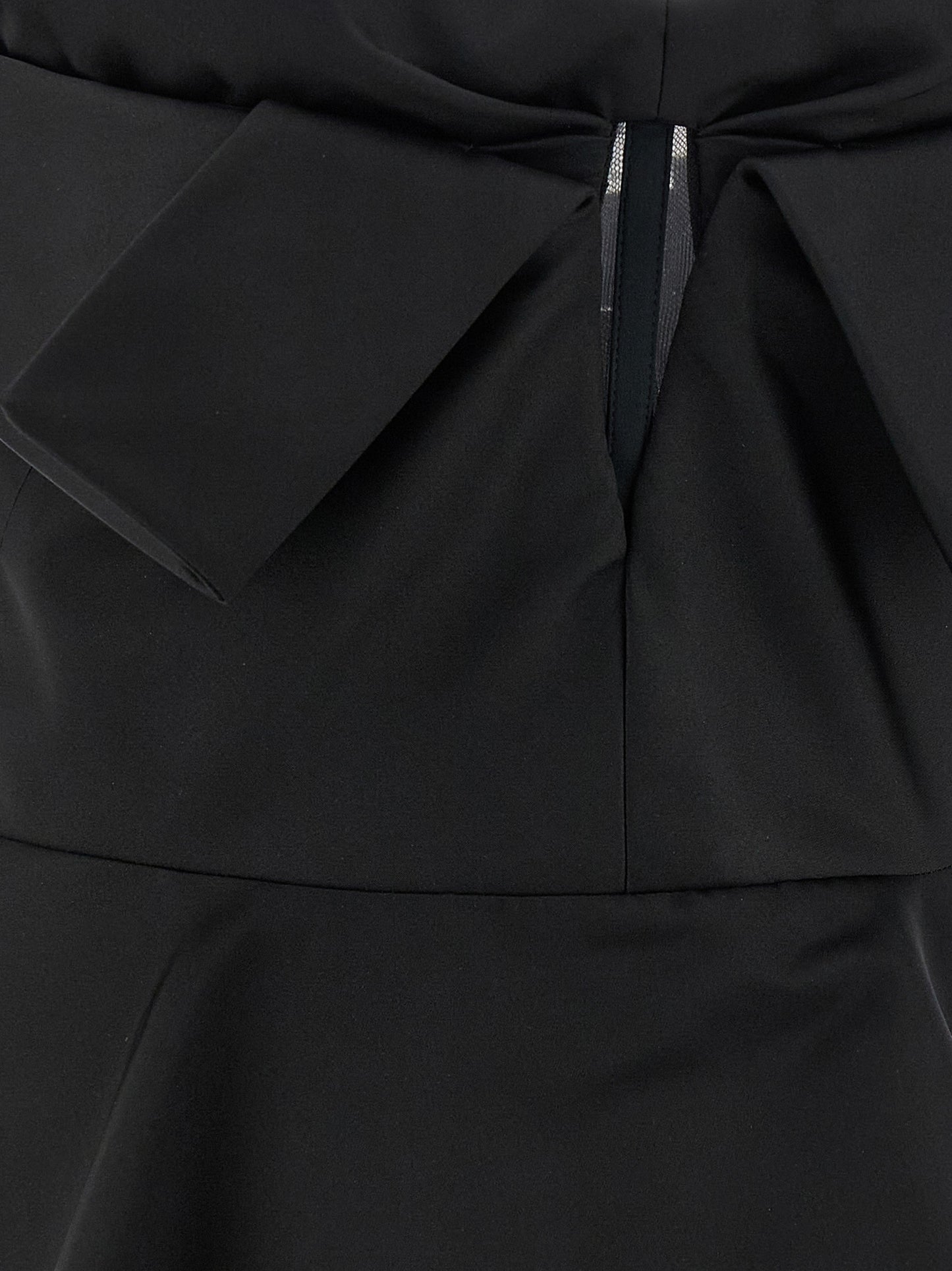 Tank Top by Alexander McQueen for women in polyester & silk black presents a uncompromising silhouette, artfully detailed with a uncompromising and for a sophisticated, uncompromising finish.