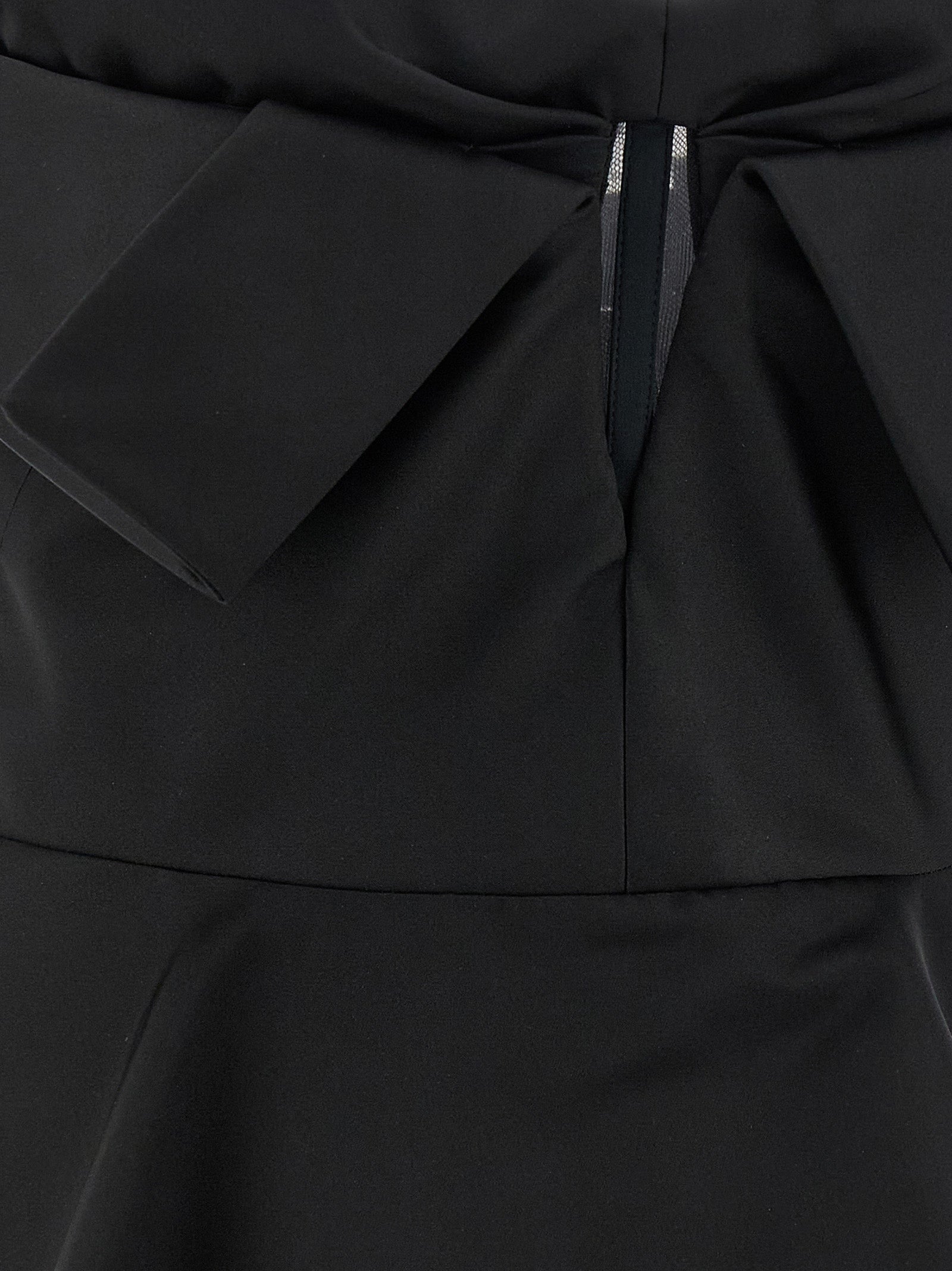 Tank Top by Alexander McQueen for women in polyester & silk black presents a uncompromising silhouette, artfully detailed with a uncompromising and for a sophisticated, uncompromising finish.