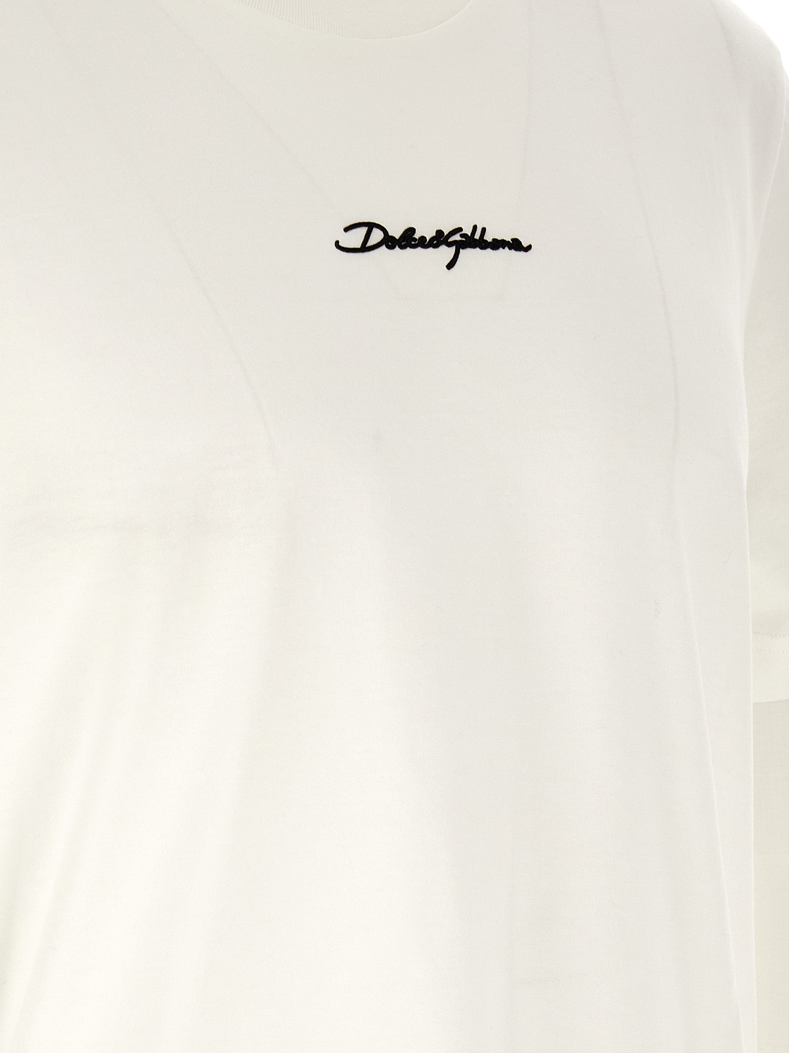 T-Shirt by Dolce & Gabbana for men in cotton white showcases a fashionable silhouette, elegantly detailed with a fashionable and crew neckline for a sophisticated, high-fashion look.