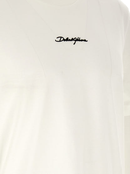 T-Shirt by Dolce & Gabbana for men in cotton white showcases a fashionable silhouette, elegantly detailed with a fashionable and crew neckline for a sophisticated, high-fashion look.