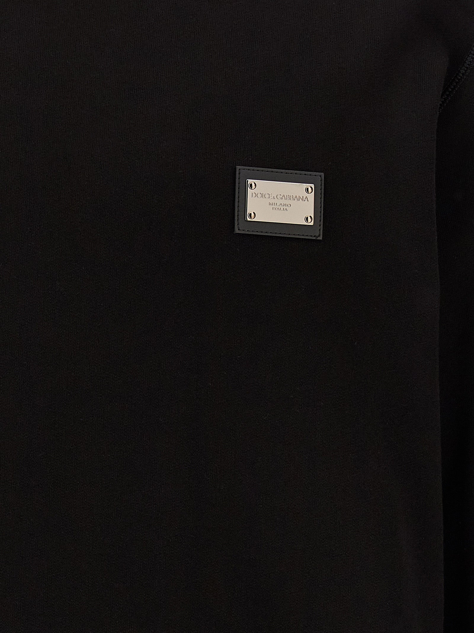Sweatshirt by Dolce & Gabbana for men in leather & cotton black features an exquisite silhouette, showcasing and crew neckline details for a exquisite look.