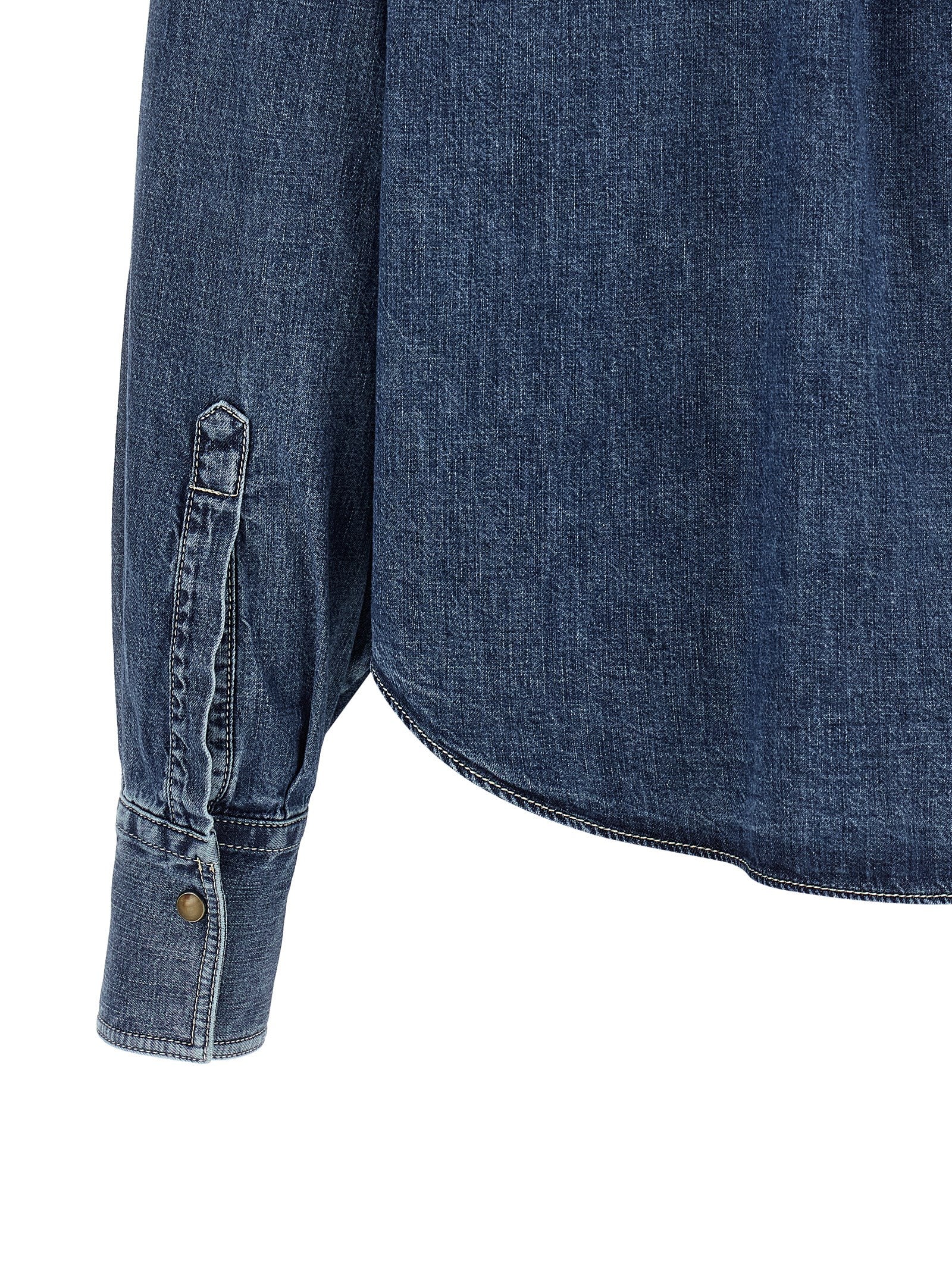 Blouse by Brunello Cucinelli for women in denim cotton blue showcases a sublime silhouette, artfully detailed with a sublime and for a sophisticated, sublime finish.