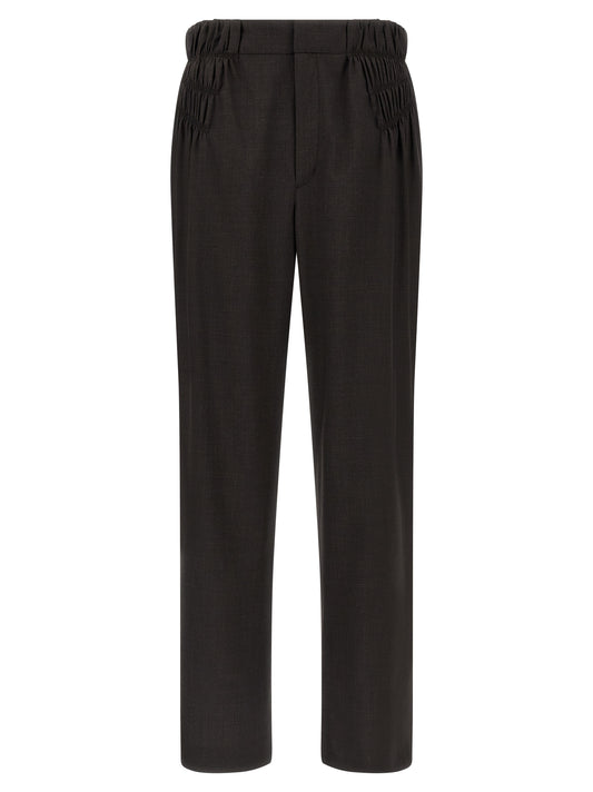 Trousers by Kiko Kostadinov for men in virgin wool brown presents a smart silhouette, meticulously detailed with a smart straight & wide, a smart long, and a smart .