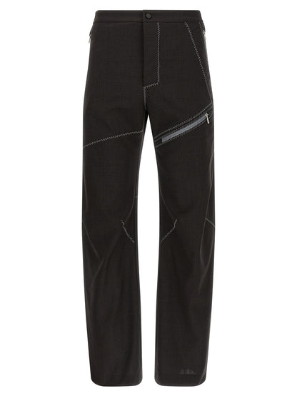 Trousers by Kiko Kostadinov for men in virgin wool brown features a artisanal silhouette, showcasing a sophisticated straight-leg with a long and for a artisanal finish.