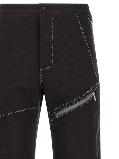Trousers by Kiko Kostadinov for men in virgin wool brown features a tailored silhouette with a tailored straight-leg, defined by its long and a sophisticated .