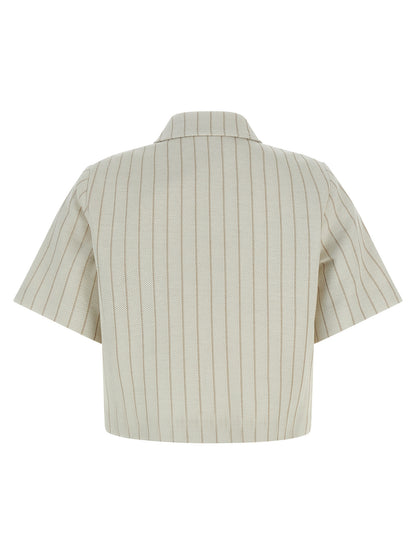 Overcoat by Max Mara for women in cotton beige & pinstripe features an voluminous silhouette, showcasing distinct pockets and a voluminous shirt-collar neckline for a truly voluminous aesthetic.