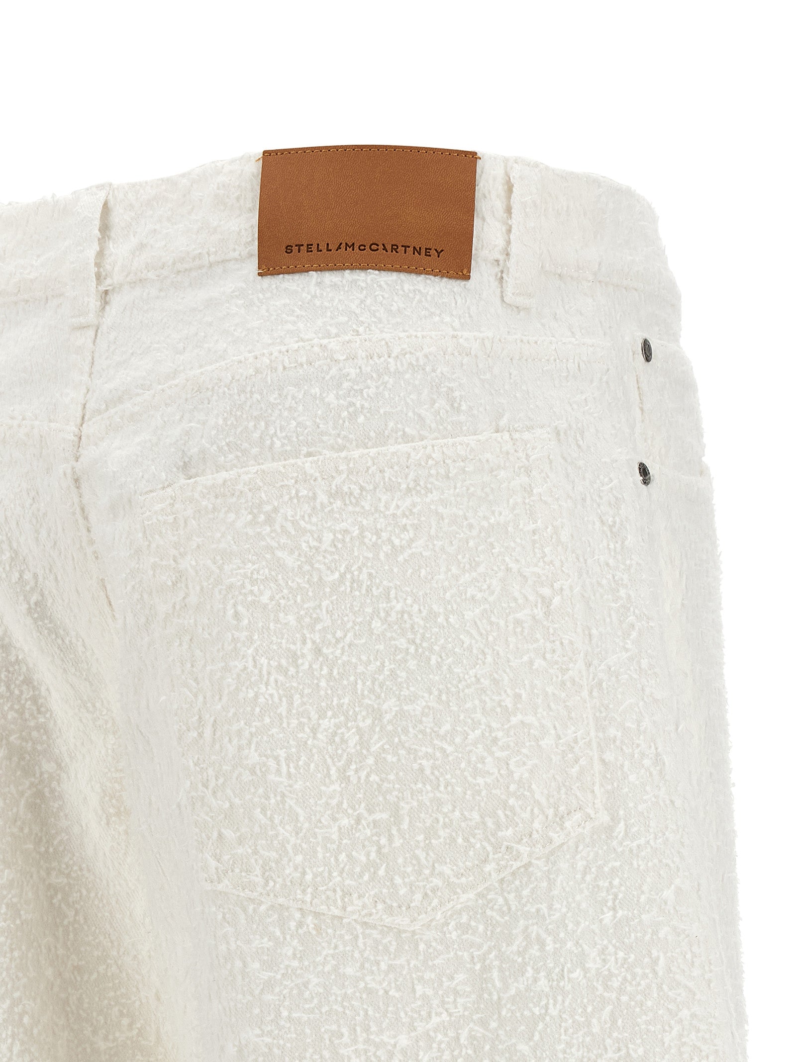 Jeans by Stella McCartney for women in denim cotton white & patterned presents a tailored silhouette, showcasing a tailored wide and long cut with a refined for a truly tailored aesthetic.