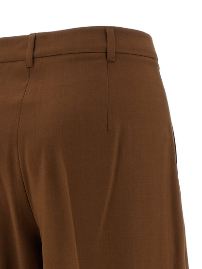 Trousers by Max Mara for women in virgin wool brown presents a smart silhouette, meticulously detailed with a smart straight-leg & wide, a smart long, and a smart .