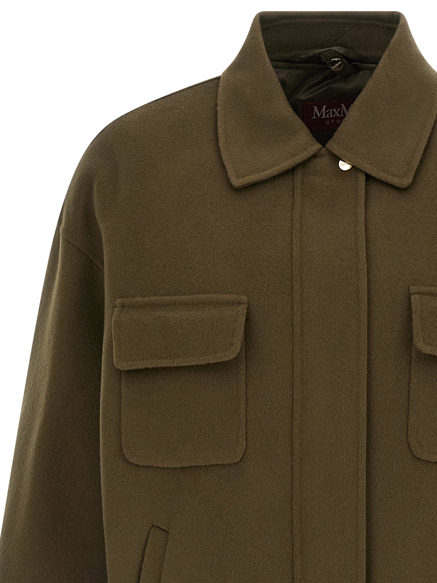 Vest by Max Mara for women in virgin wool & silk bicolour & green showcases a dynamic silhouette, perfectly balancing pockets & insulated with a dynamic shirt-collar neckline for a sophisticated, high-fashion look.