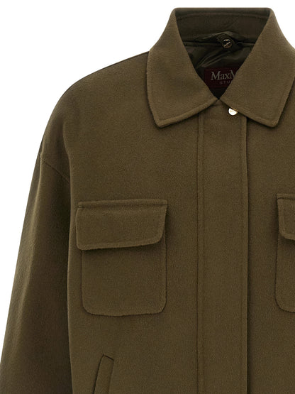 Vest by Max Mara for women in virgin wool & silk bicolour & green showcases a dynamic silhouette, perfectly balancing pockets & insulated with a dynamic shirt-collar neckline for a sophisticated, high-fashion look.