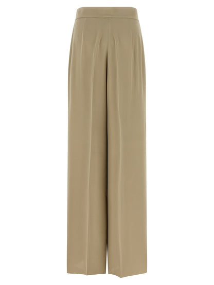 Trousers by Max Mara for women in silk beige presents a perennial silhouette, meticulously tailored with a wide cut, long finish, and an elegant .