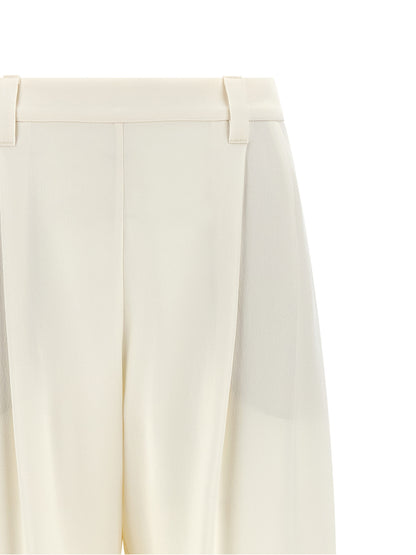 Casual Pants by Brunello Cucinelli for women in viscose linen twill beige features a polished silhouette with a polished straight & relaxed-fit, reaching a polished long and finished with a polished .