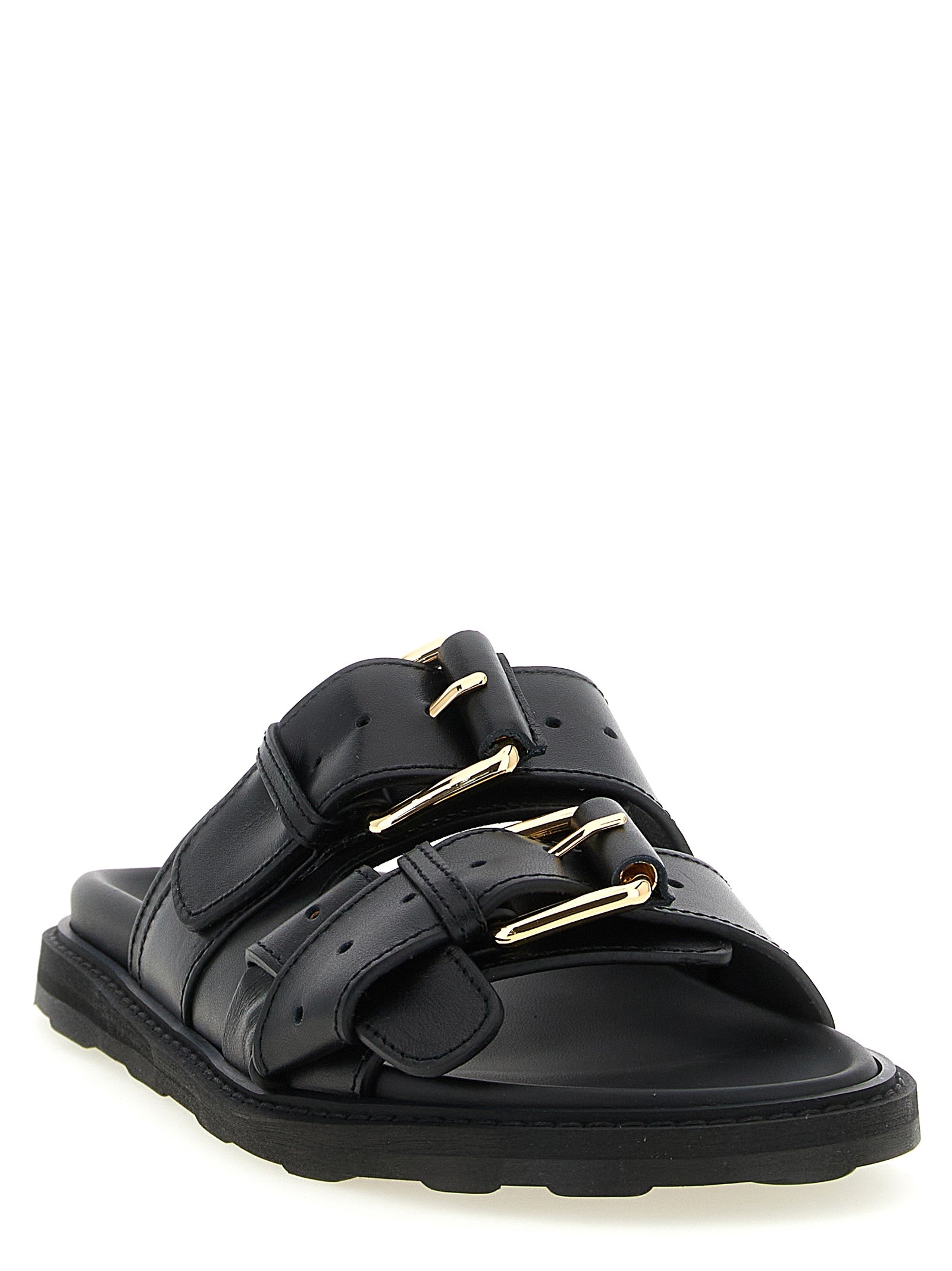 Sliders Sandals Flat Shoes by Moschino for women in calfskin leather black showcases a enchanting silhouette as part of the City Women's Calfskin Leather Sliders Sandals Flat Shoes collection, defined by a enchanting and for a enchanting look.