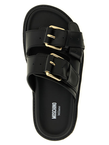 Sliders Sandals Flat Shoes by Moschino for women in calfskin leather black showcases a dynamic silhouette, artfully capturing City Women's Calfskin Leather Sliders Sandals Flat Shoes through its distinctive and elegant .