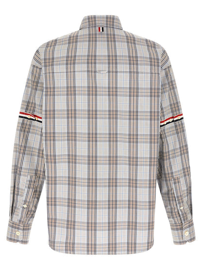 Shirt by Thom Browne for men in cotton multicolor & plaid showcases a sleek silhouette, elegantly detailed with a sleek and for a sleek finish.