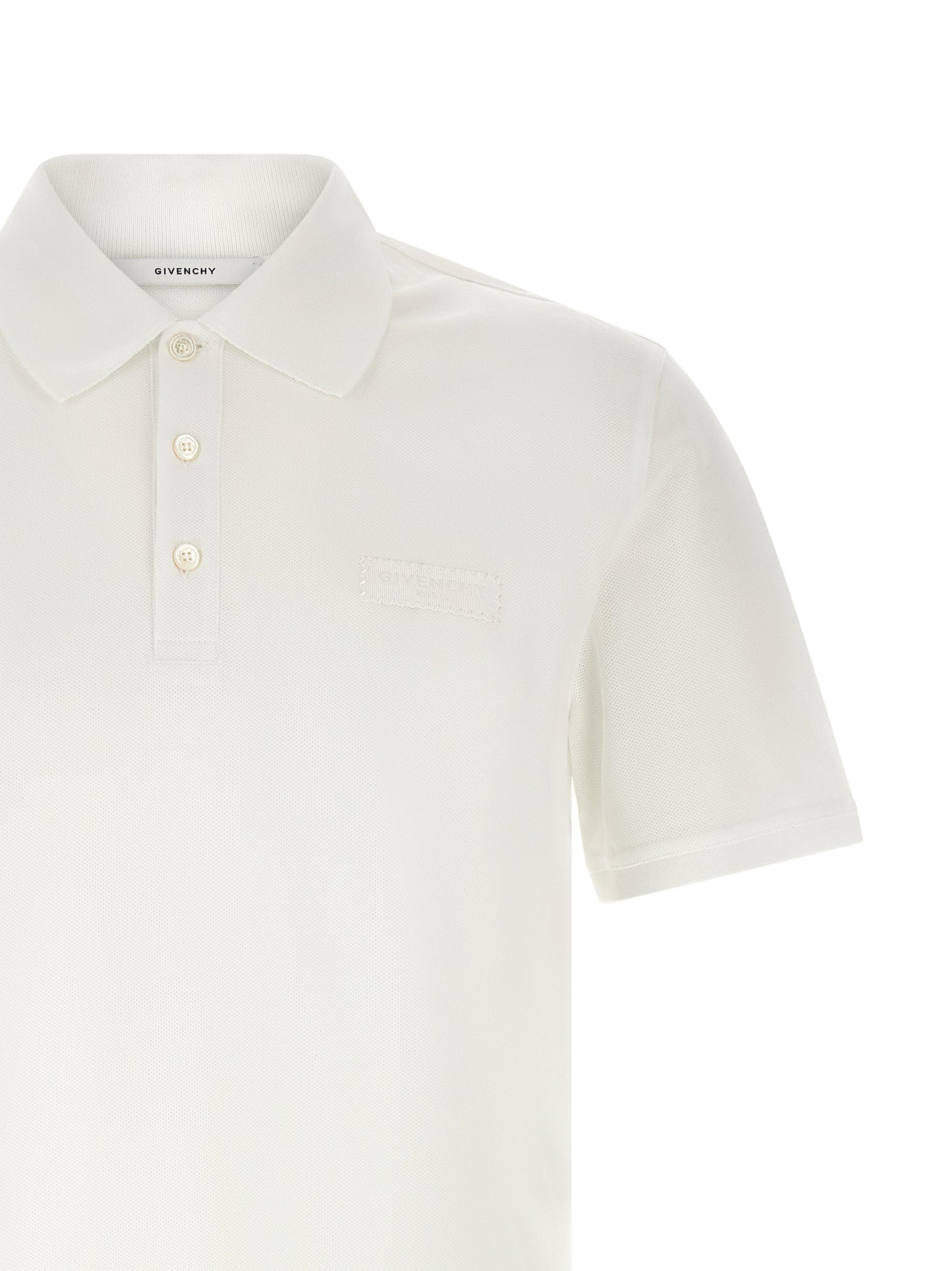Polo Shirt by Givenchy for men in cotton white presents a crisp silhouette, artfully detailed with a crisp and crisp .